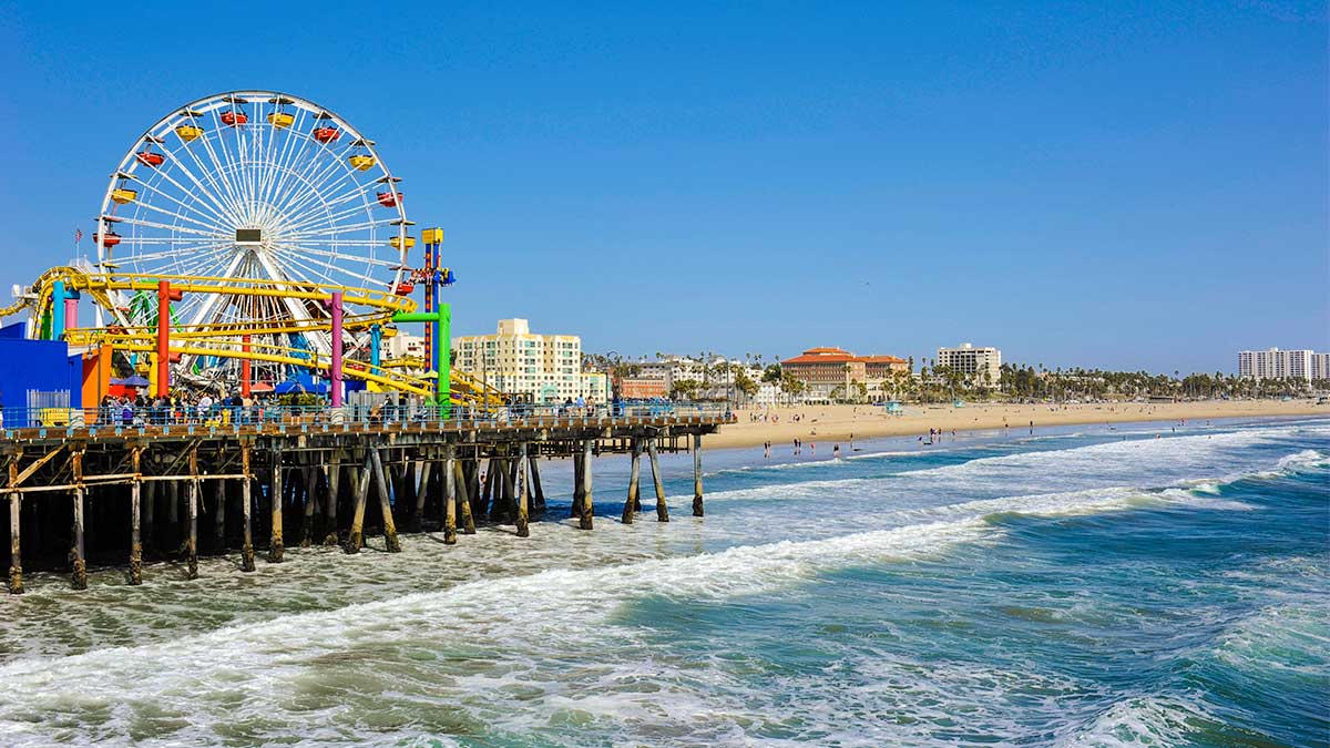 close up of ferris wheel and pier with ocear at Santa Monica Pier in Los Angeles, California, USA